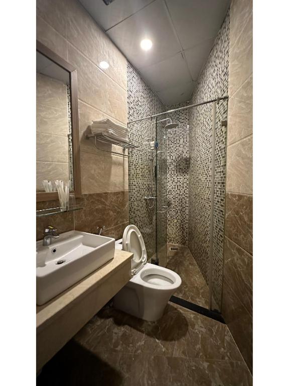Koupelna v ubytování Pinus Hotel