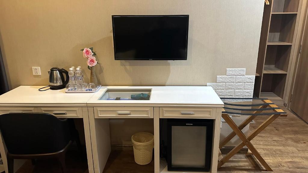 TV a/nebo společenská místnost v ubytování Pinus Hotel