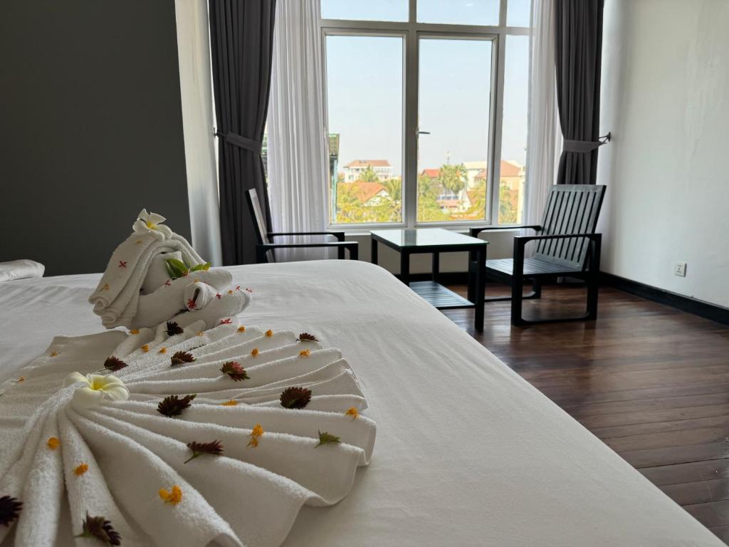 Postel nebo postele na pokoji v ubytování Hotel La Maravilla