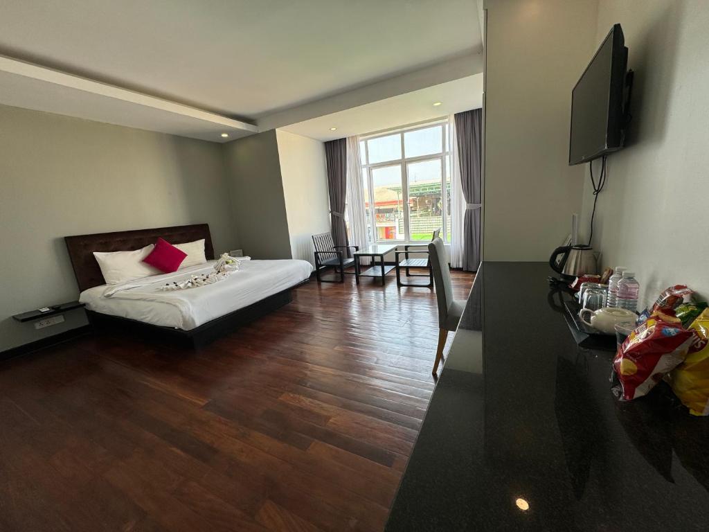 Postel nebo postele na pokoji v ubytování Hotel La Maravilla