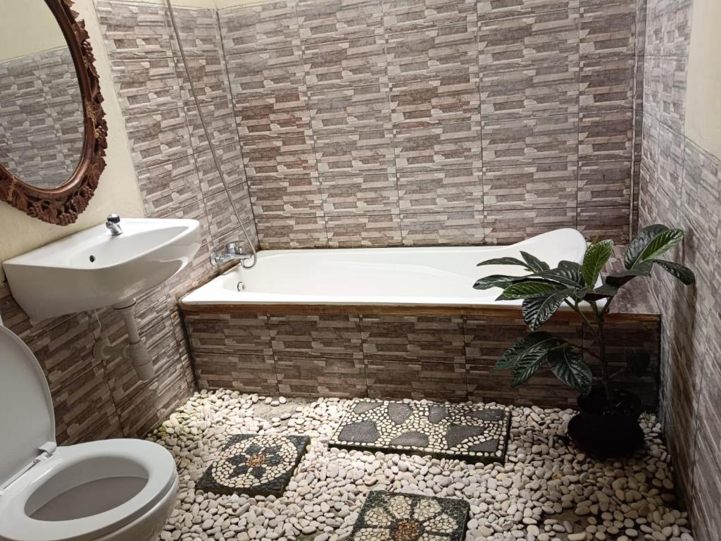 Un baño de Villa Mak Cik