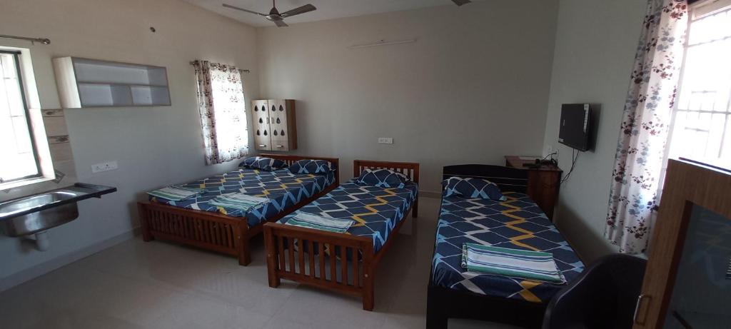 Shantham Service Apartments, Indumanagar, Coimbatore - Quarto Familiar Deluxe