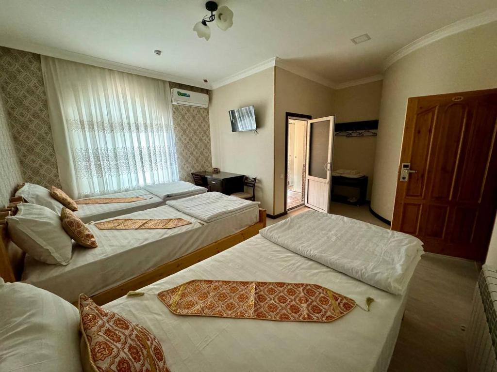 Qamar Hotel - 带淋浴的三重房间