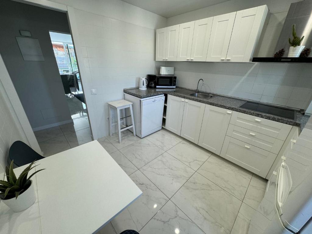 Kuchyň nebo kuchyňský kout v ubytování Las Viñas Apartment