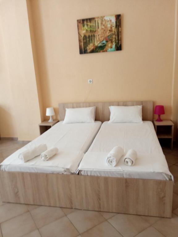 Postel nebo postele na pokoji v ubytování GOLDEN ROOMS