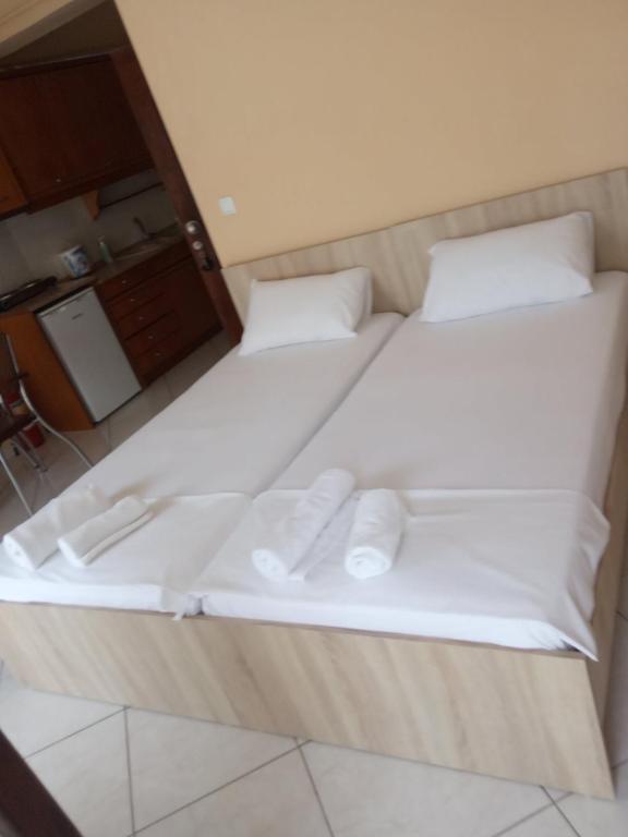 Postel nebo postele na pokoji v ubytování GOLDEN ROOMS
