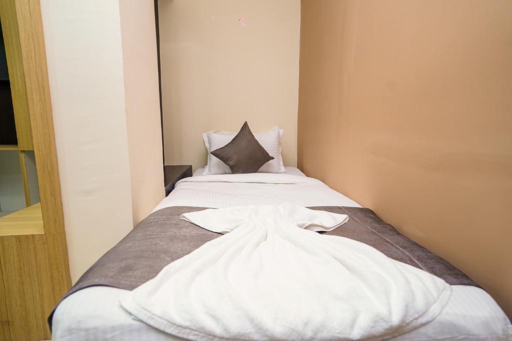 Postel nebo postele na pokoji v ubytování Hotel Middleton NXT