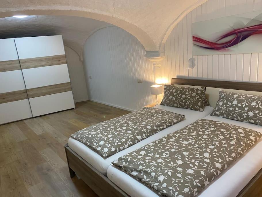 Postel nebo postele na pokoji v ubytování Gemütliche Wohnung in Oberbayern