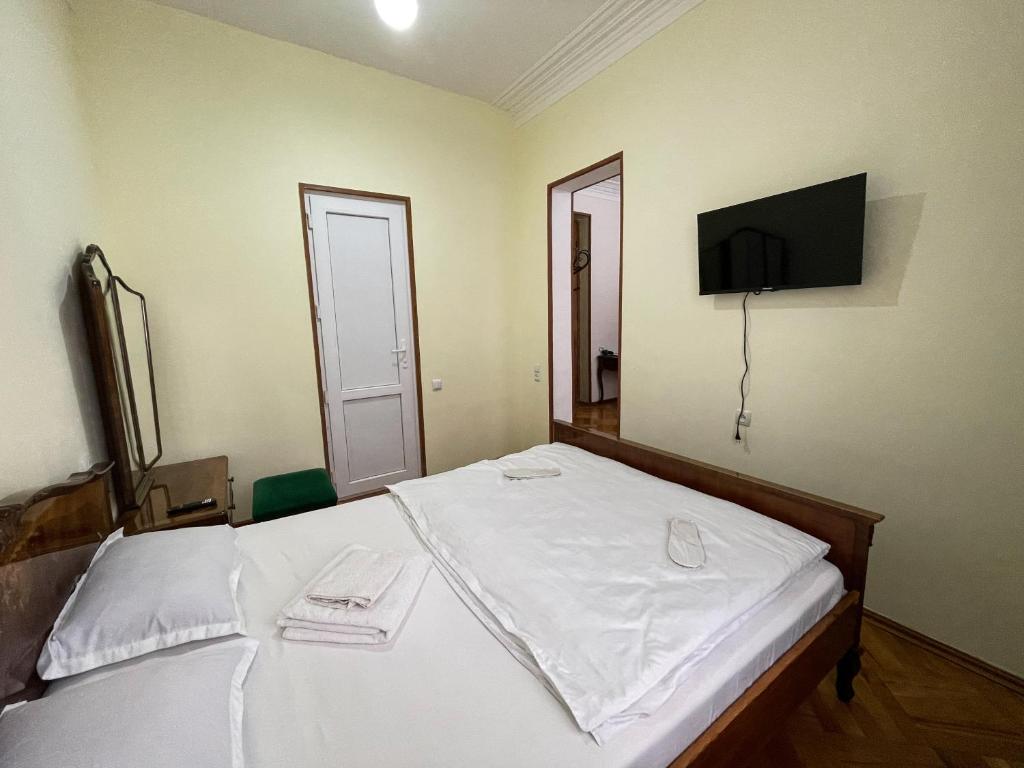 Postel nebo postele na pokoji v ubytování Guest House Top Floor