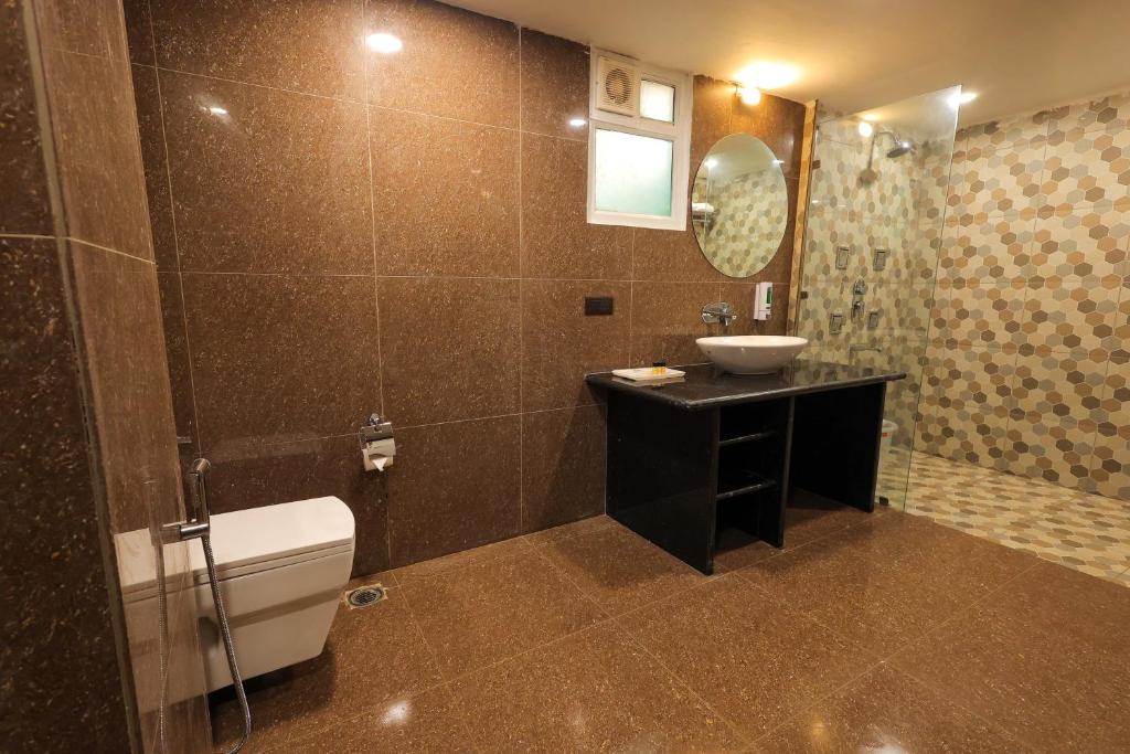 Koupelna v ubytování Hotel Ganga Ratan