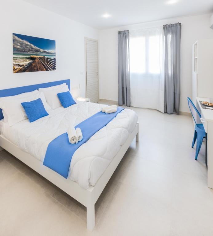 Postel nebo postele na pokoji v ubytování Hybla Major B&B