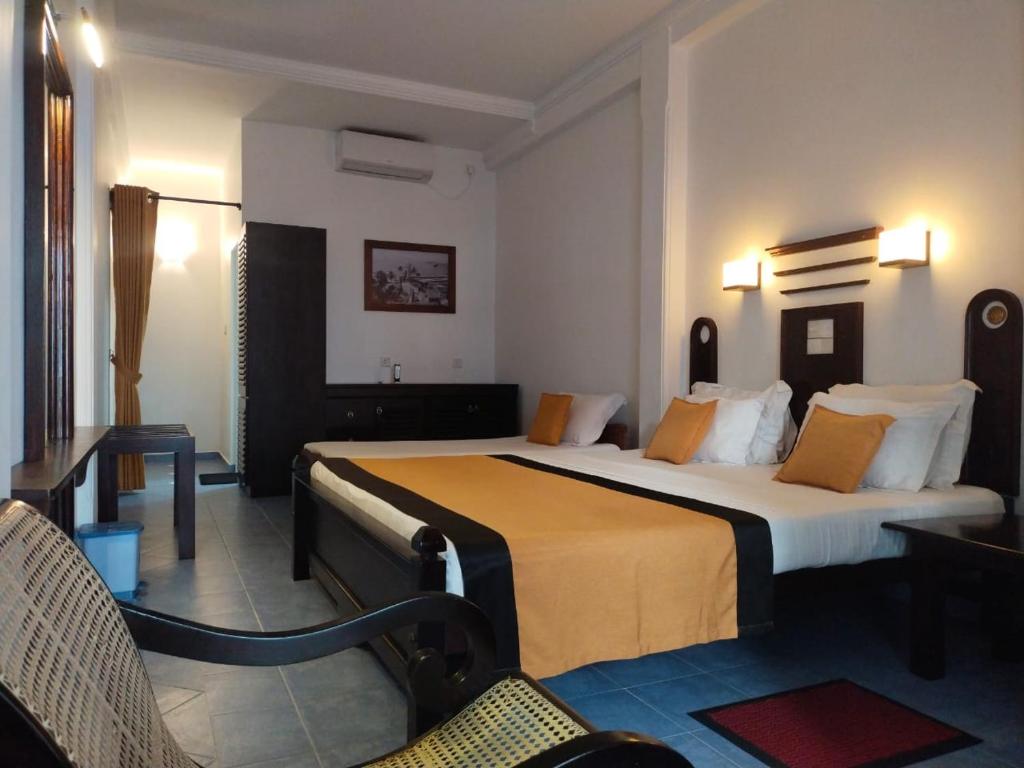 Postel nebo postele na pokoji v ubytování DALAWELLA BEACH RESORT