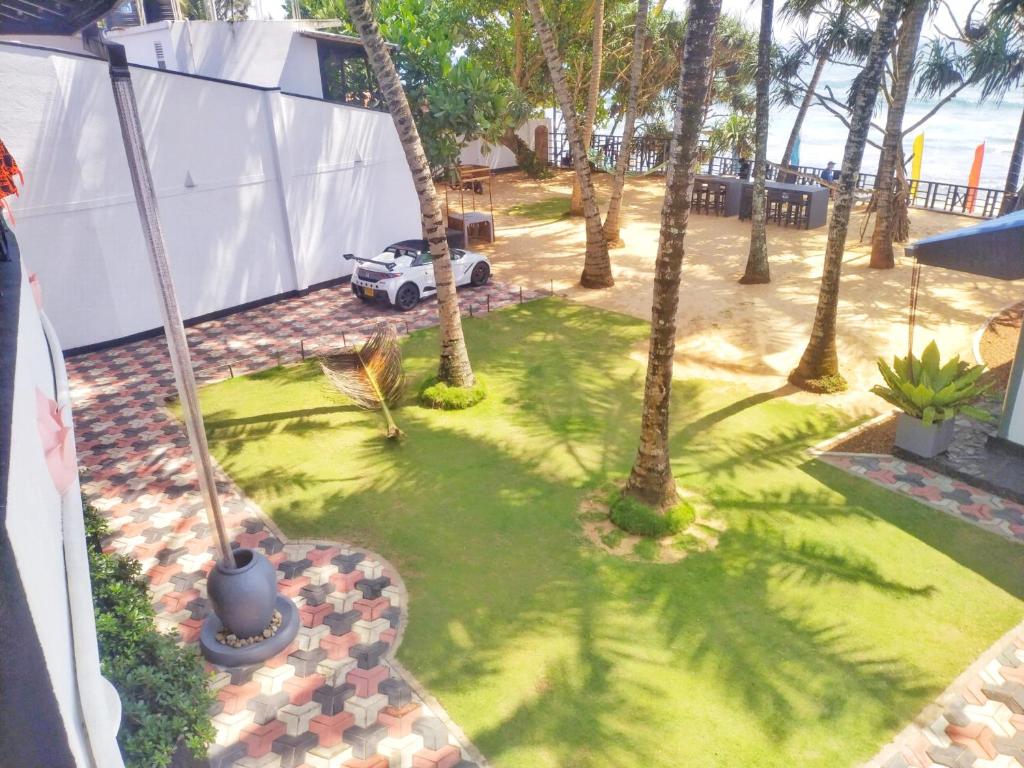 Zahrada ubytování DALAWELLA BEACH RESORT