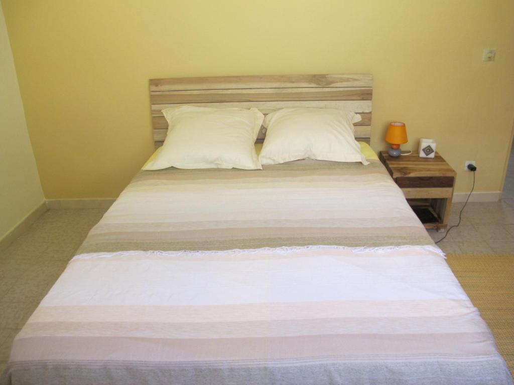 Postel nebo postele na pokoji v ubytování Villa Marie Daniel