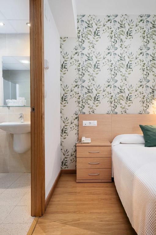 Postel nebo postele na pokoji v ubytování Hotel Mi Casa