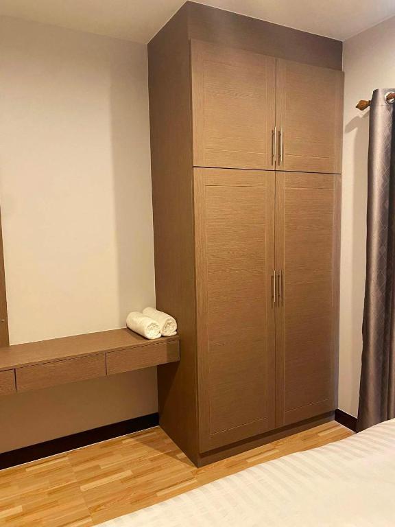 Postel nebo postele na pokoji v ubytování Hm House Patong
