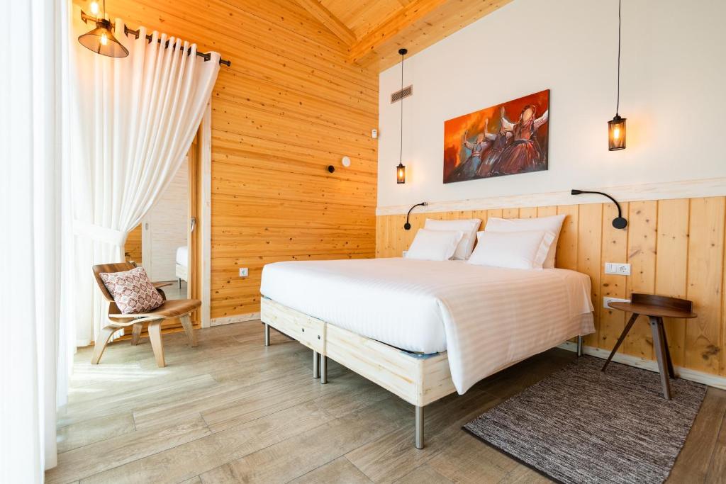 Postel nebo postele na pokoji v ubytování Rinoterra Minho