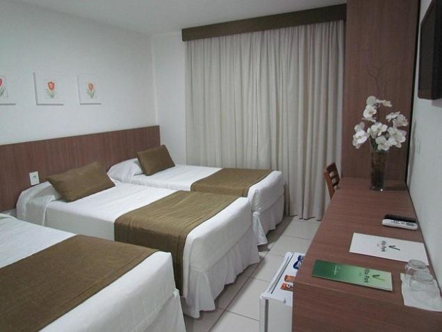 Cama ou camas em um quarto em Villa Park Hotel
