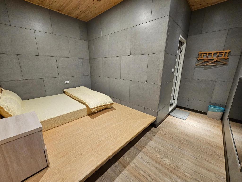 Cama o camas de una habitación en 正記製茶所民宿