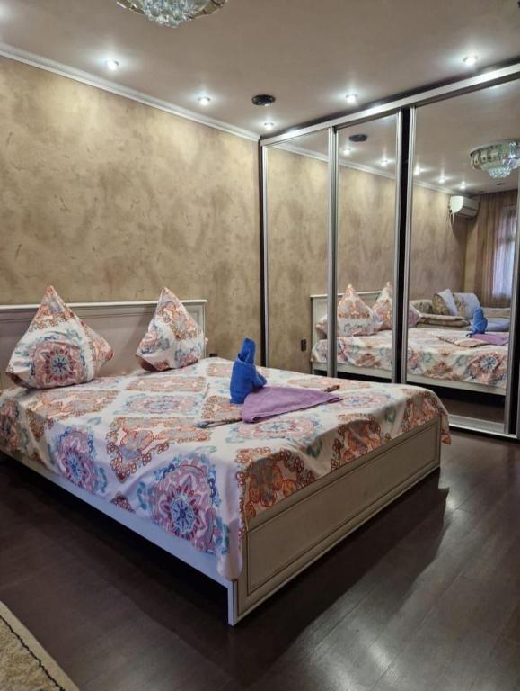 Krevet ili kreveti u jedinici u okviru objekta Уютные аппартаменты
