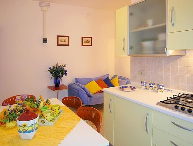 Kuchyň nebo kuchyňský kout v ubytování Appartamenti Bella Venezia