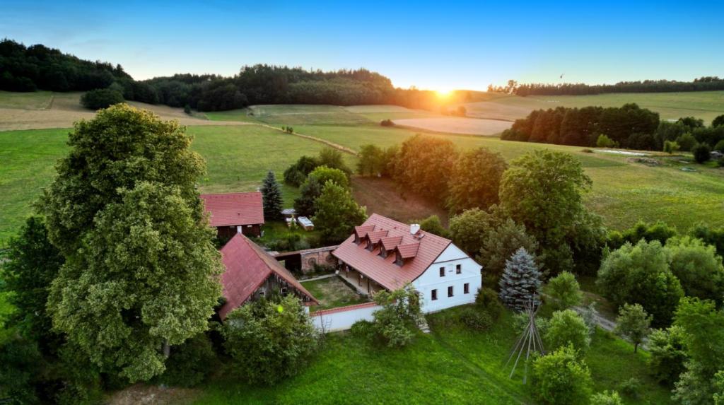 an aerial view of a house in a field at Yogashrama traditional in Ústí nad Orlicí