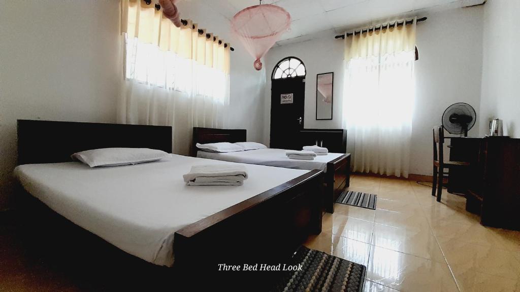 Postel nebo postele na pokoji v ubytování Le Meridien BnB