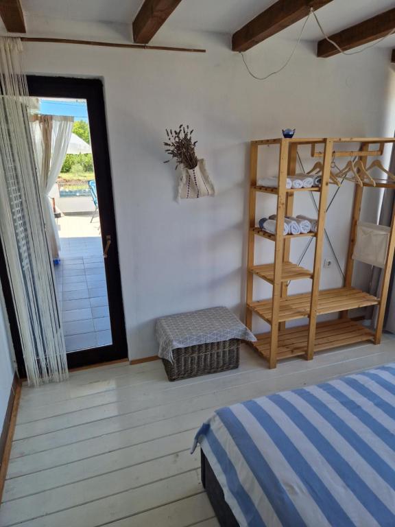 Łóżko lub łóżka w pokoju w obiekcie Apartment Buric
