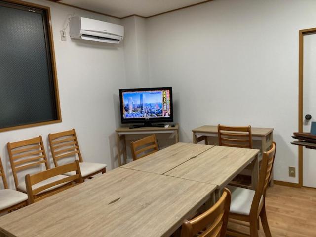 TV a/nebo společenská místnost v ubytování Sky Tree INN Ⅱ（晴樹宿Ⅱ）