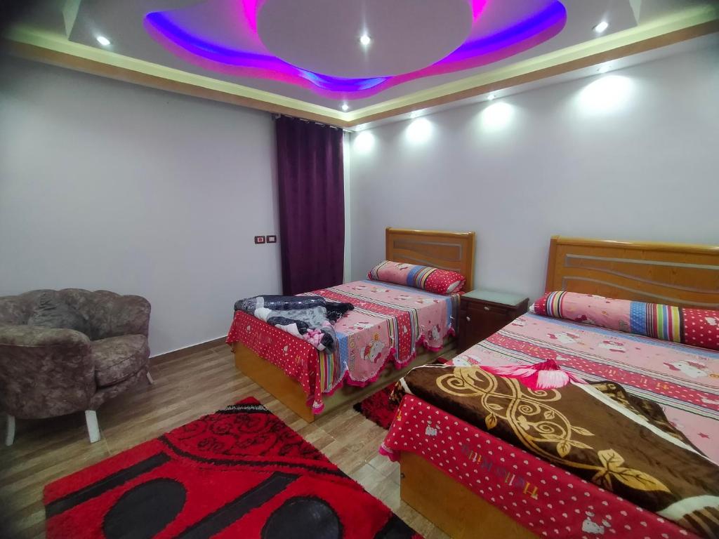 Postel nebo postele na pokoji v ubytování شقة فندقية للايجار