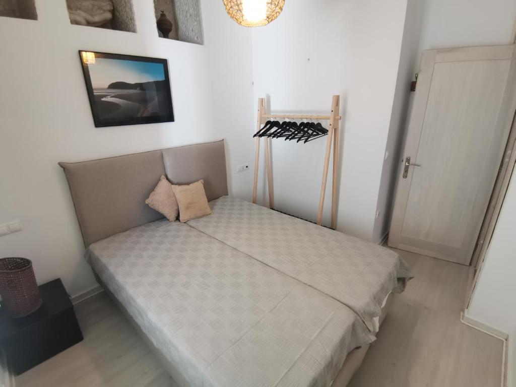 Postel nebo postele na pokoji v ubytování VILLA VASILIS ORNOS