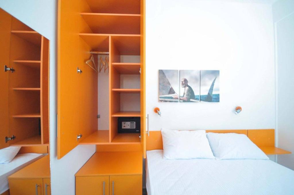 Postel nebo postele na pokoji v ubytování Apartments M Čanj