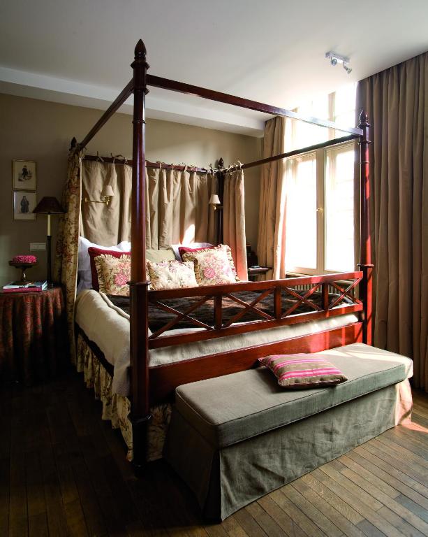 Postel nebo postele na pokoji v ubytování B&B Exclusive Guesthouse Bonifacius