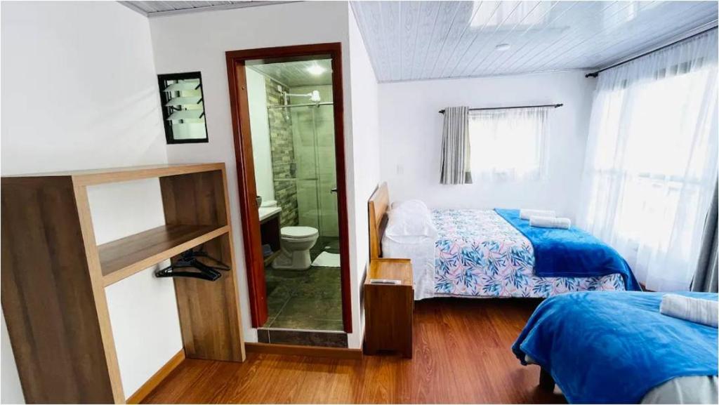 Postel nebo postele na pokoji v ubytování Casa de Descanso Villa Mongui