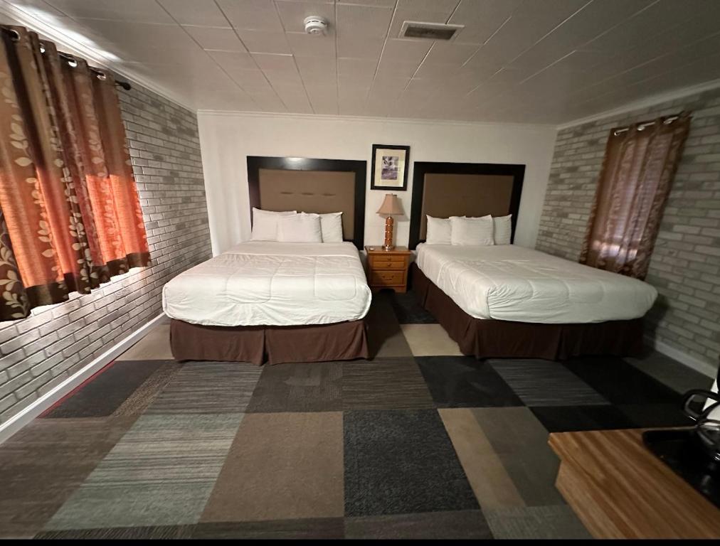 Postel nebo postele na pokoji v ubytování Motel Nicholas