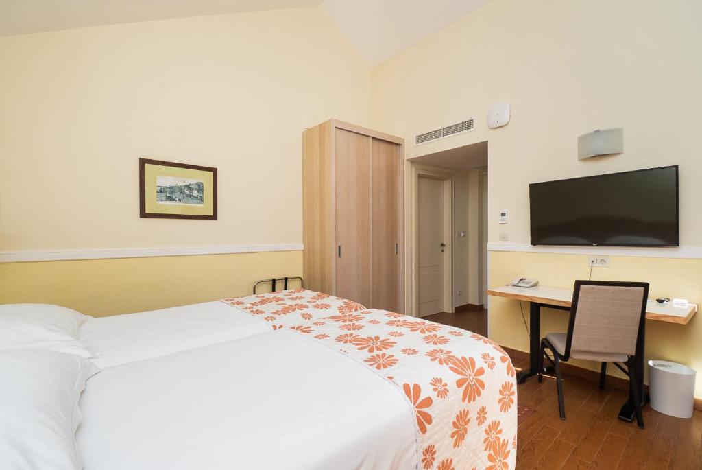 Posteľ alebo postele v izbe v ubytovaní Amadria Park Apartments Šibenik