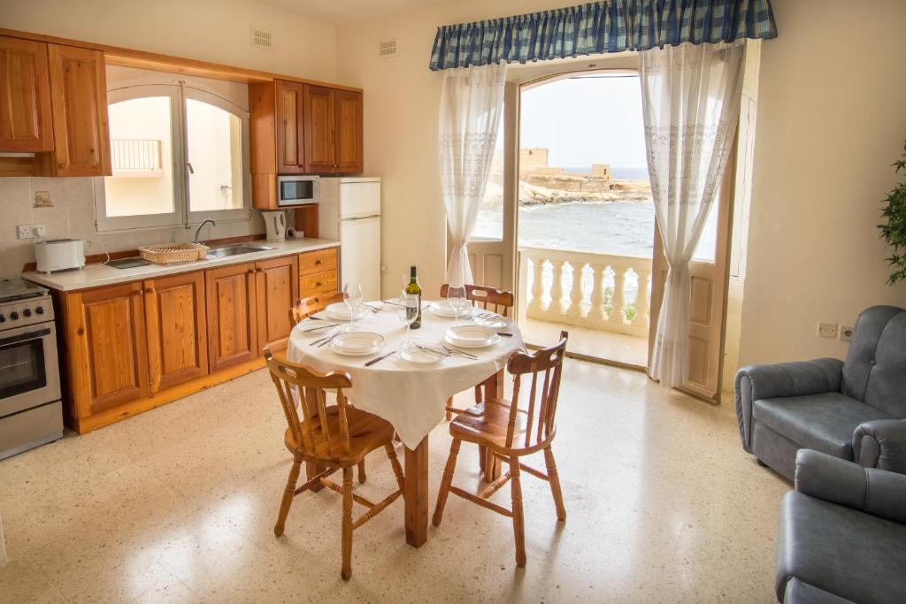 Kuchyň nebo kuchyňský kout v ubytování Horizon Apartments Gozo