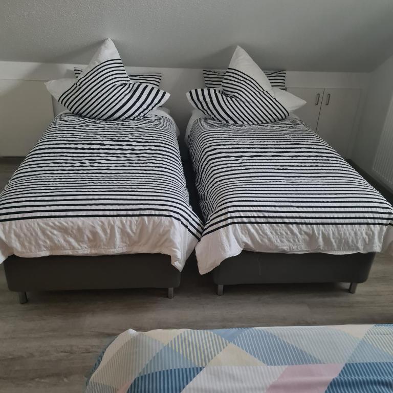 Postel nebo postele na pokoji v ubytování Gästehaus Treder