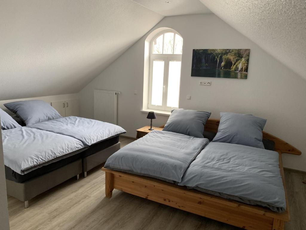 Postel nebo postele na pokoji v ubytování Gästehaus Treder