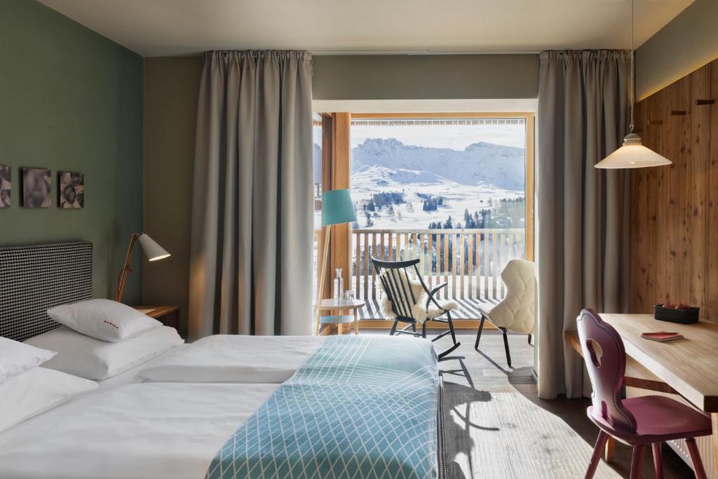 Postel nebo postele na pokoji v ubytování ICARO Hotel