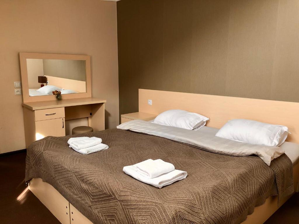 Postel nebo postele na pokoji v ubytování Guest House Vanda