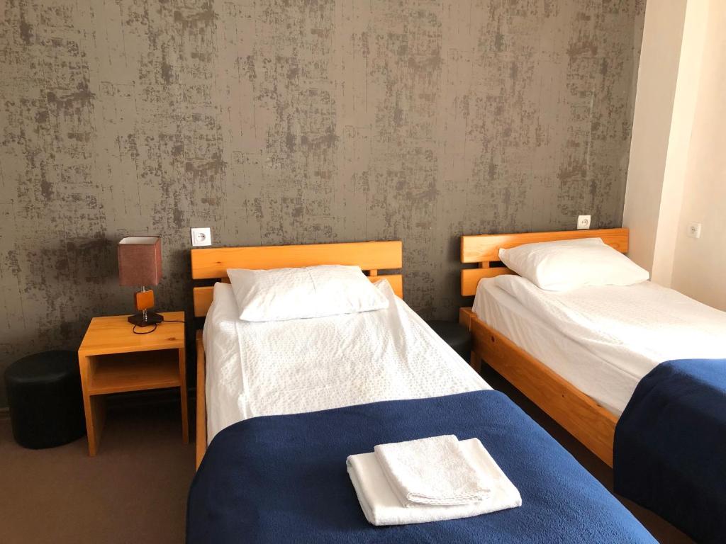 Postel nebo postele na pokoji v ubytování Guest House Vanda