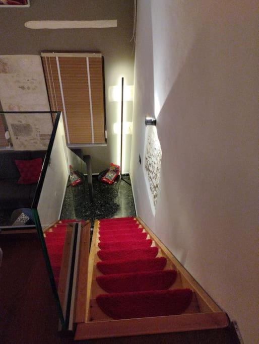 Postel nebo postele na pokoji v ubytování Arcade central retro apartment