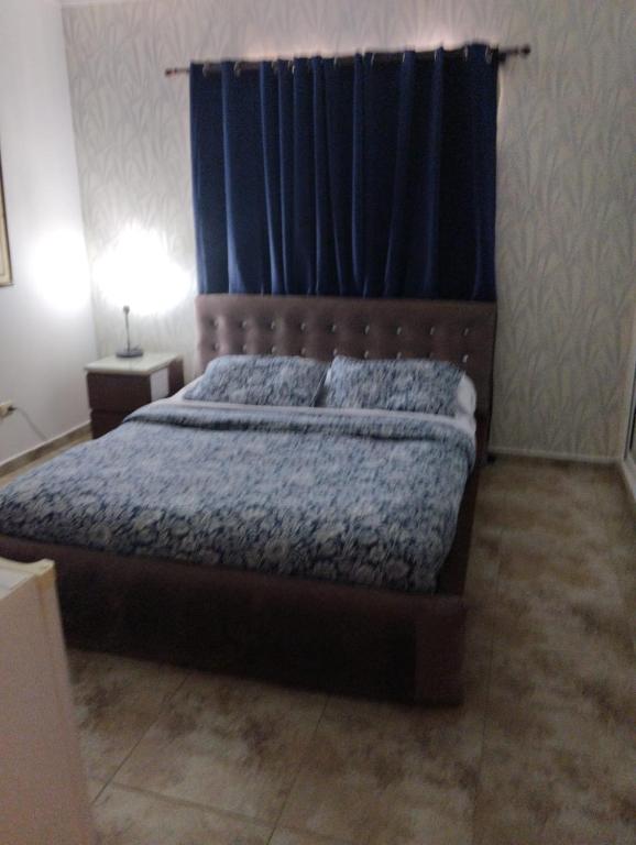 Postel nebo postele na pokoji v ubytování Nely y Pietro share apartment