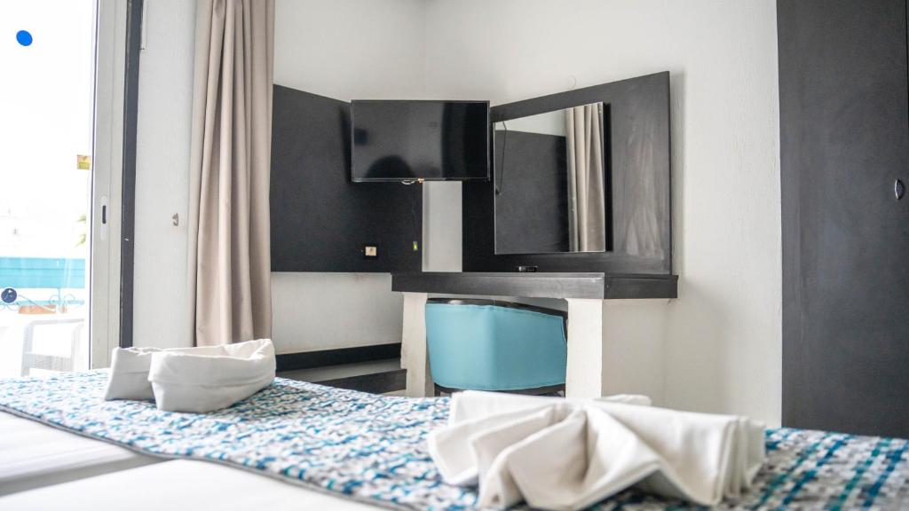 Postel nebo postele na pokoji v ubytování HOTEL KAISER