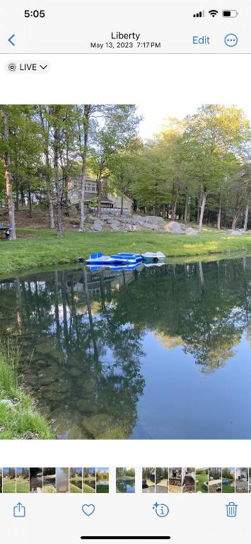 two pictures of a lake with boats in the water at Catskills Pond Getaway in Liberty