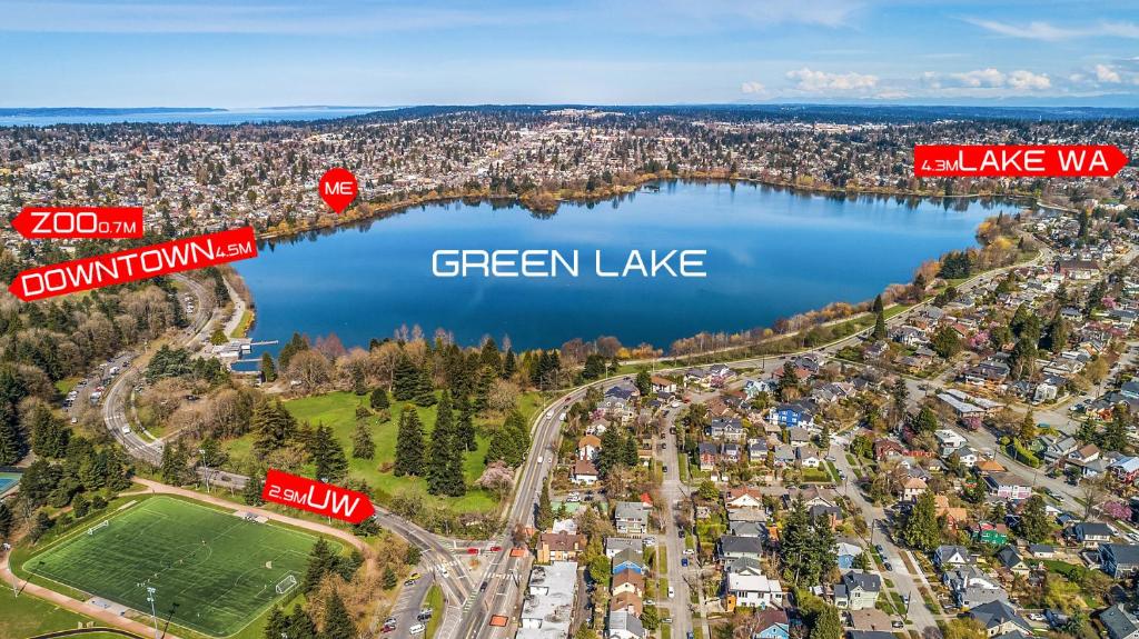 an aerial view of a lake and a city with a stop sign at Green Lake 1st Line Home D Full Modern Remodeled in Seattle