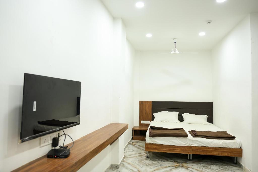 TV a/nebo společenská místnost v ubytování Hotel Aaram Kalupur