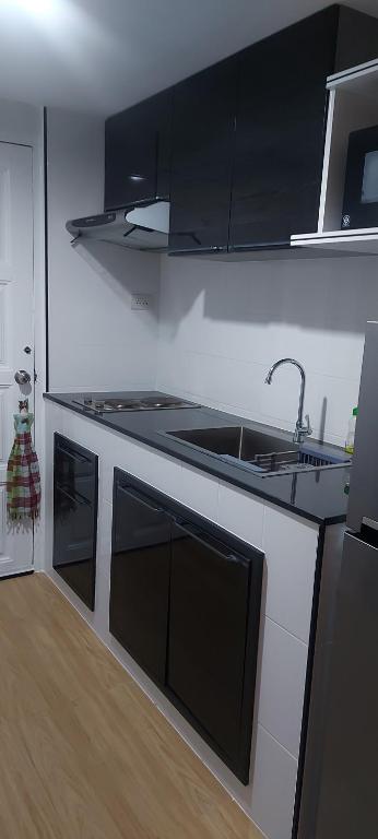 Kuchyň nebo kuchyňský kout v ubytování Vip condo chain by Linda