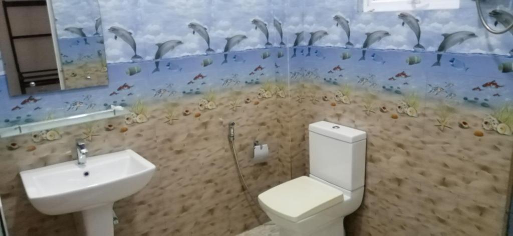 Koupelna v ubytování Green jade Inn Mirissa